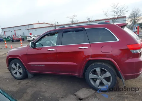 2014 Jeep Grand Cherokee Overland z USA, uszkodzony, nr VIN 1C4RJFCM1EC389355